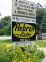 Hebron Realty & Insurance logo