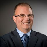 John E. Sharpe, SIOR, LEED AP, CCIM