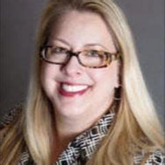 Laura B Buehner
