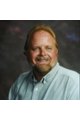 MARK E. MORROW