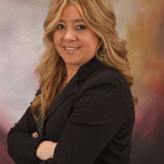 KELLY E. SPINALLI