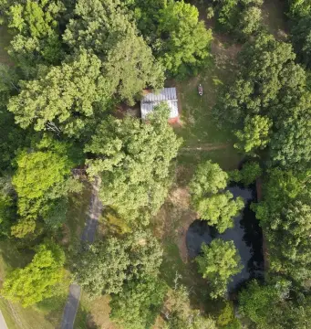 Unrestricted Acreage with Private Pond