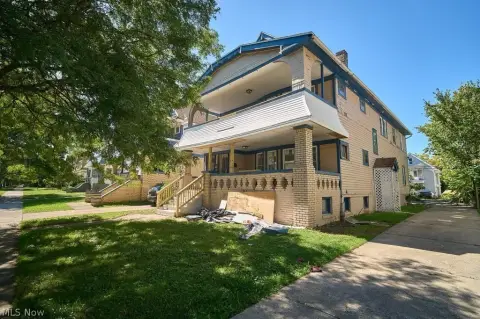 Renovation-Ready Duplex with Porches