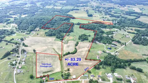 Agricultural Land with Pond and Barns