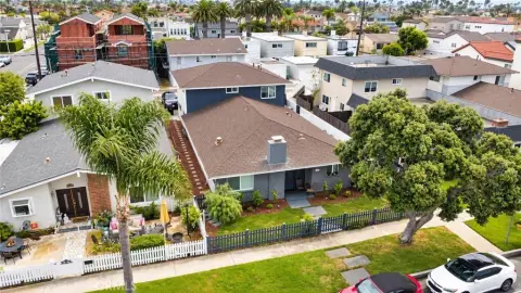 Renovated Coastal Triplex with Private Yards