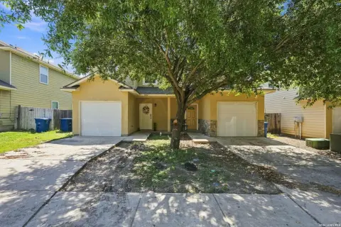 Fully Occupied Duplex with Garages