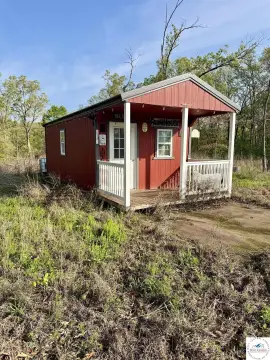Land with Unfinished Cabin, Storage