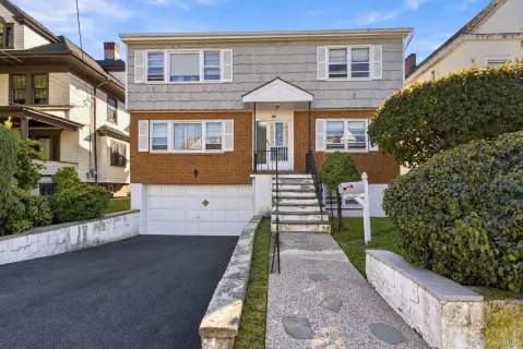 Two-Family Home with Covered Deck
