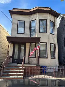 Two-Family Duplex with New Baths