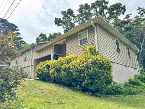 Duplex with Attached Garage and Carport