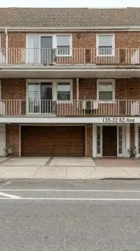 Brick Triplex with Detached Garage