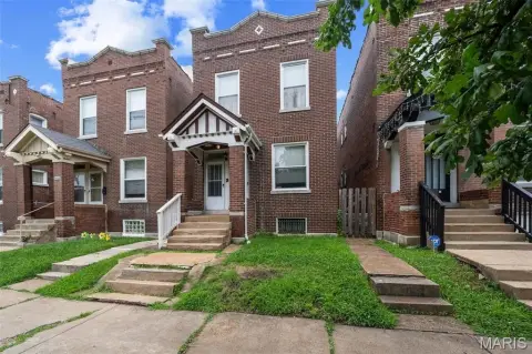 Tenant-Occupied Duplex with Balconies