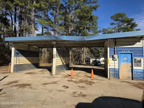 Self-Service Car Wash with Vehicle Building