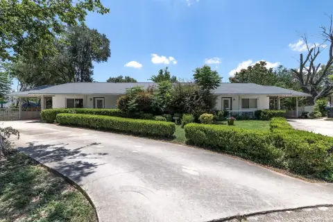 Duplex with Fenced Backyard and Carport