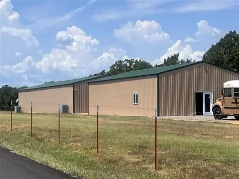 Wooded Agricultural Land with Buildings