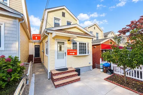 Two-Family Home with Balcony