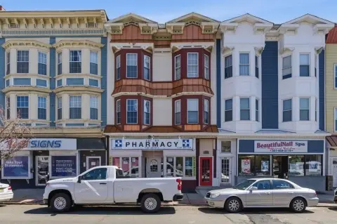 Mixed-Use Quadplex with Pharmacy