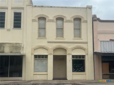 Mixed-Use Building with Apartment