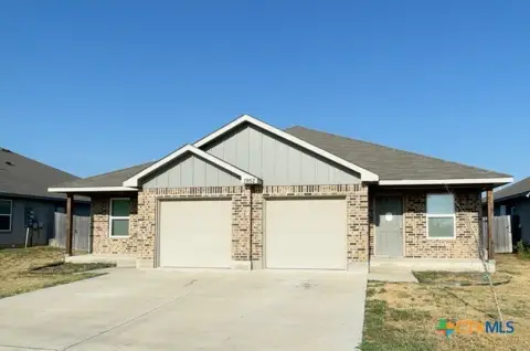 Duplex with Fenced Backyards