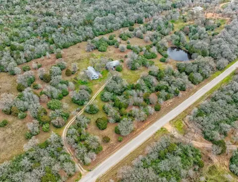 Fenced 10-Acre Retreat with Pond