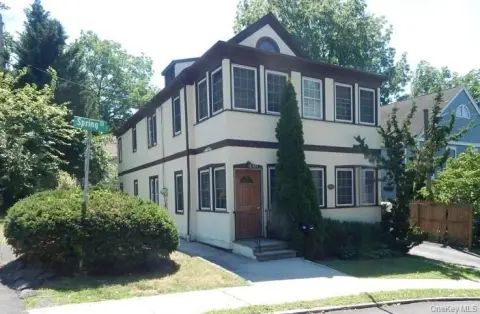 Two-Family Duplex with Sunrooms