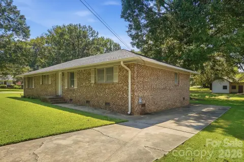 Brick Duplex with Private Driveways