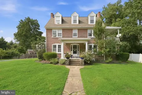 Brick Triplex with Separate Entrances