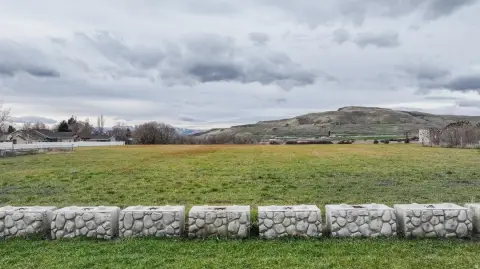 Agricultural Land with Rock House