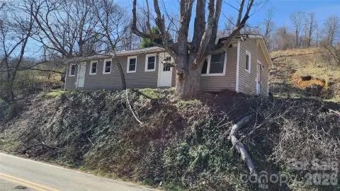 Land with Mountain and Creek Views