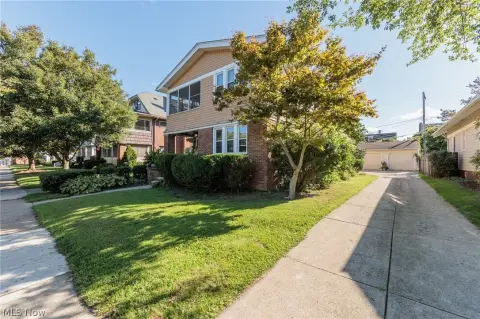 Duplex with Three-Car Garage