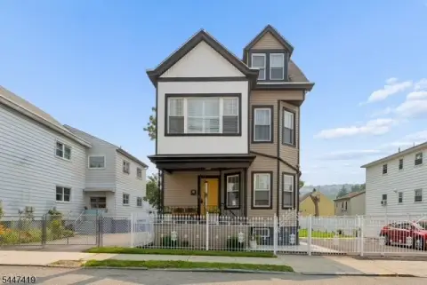 Renovated Two-Family Home with Private Driveway