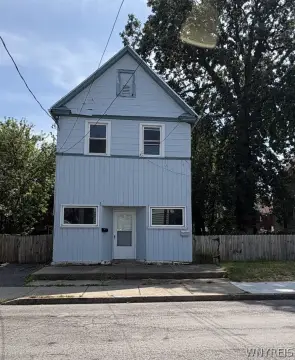 Three-Unit Two-Story Triplex with Fenced Yard