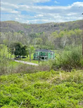 Turn-of-the-Century Farmhouse on 211 Acres
