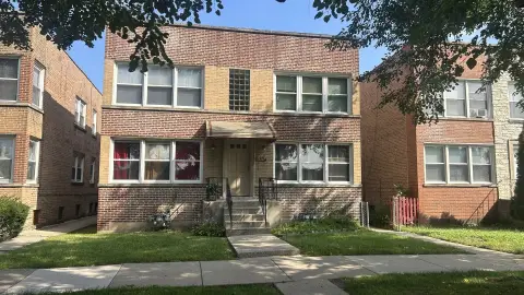Four-Unit Building with Enclosed Porches
