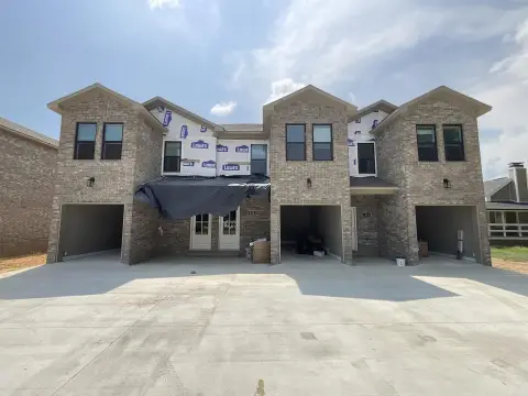 New Construction Brick Triplex