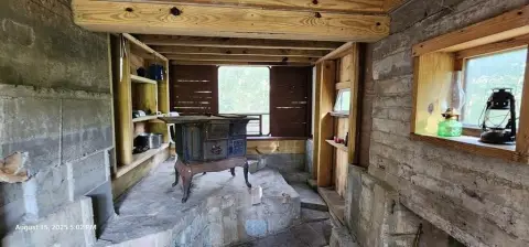 Off-Grid Wooded Lot with Cabin