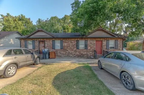 Brick Triplex With Updated Unit