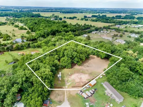 Vacant Homesite with Outbuildings