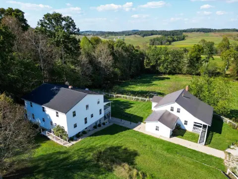 Versatile Multi-Home Property with Barns