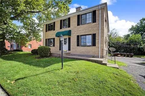 Brick Quadplex With Basement Laundry