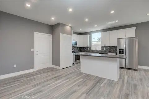 Contemporary Duplex with Tandem Garage