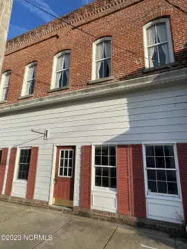 Mixed-Use Building with Rear Garage