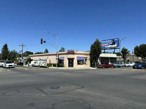 Mixed-Use Corner Property with Redevelopment
