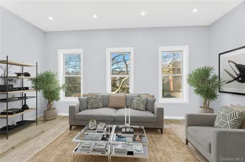 Renovated Two-Family Brick Townhouse