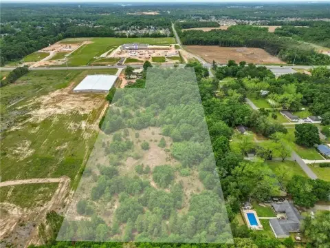 Commercial Land with Existing Improvements