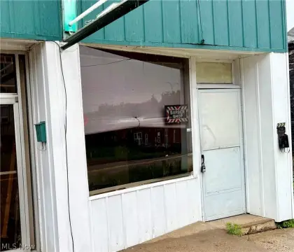 Storefront Office with Barber Setup