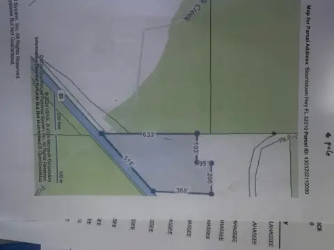 Heavily Wooded Land Near Lake