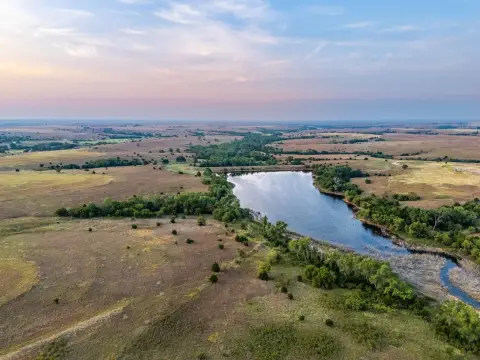 Fenced Ranch with Lake and Pond