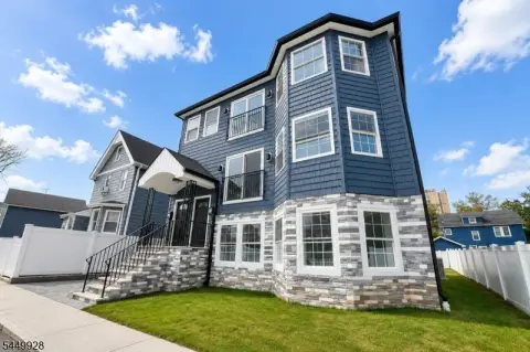 Duplex Under Construction with Fenced Yard
