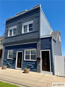 Renovated Two-Family Home with Garage